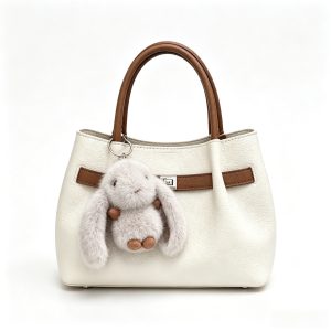 Contrast‑Trimmed Handbag With Bunny Charm